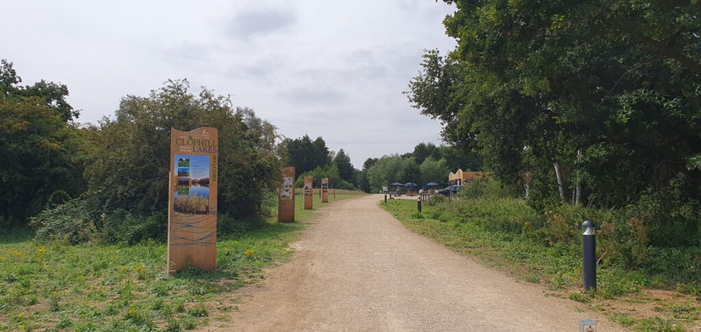 Wide path leading towards a visitor centre.