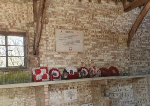 Memorial plaque inside Gibraltar Barn, Tempsford